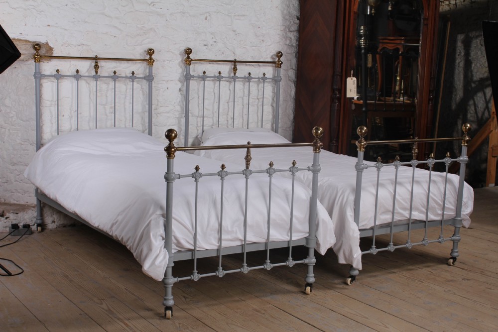 Gorgeous pair of French classic brass and iron singles