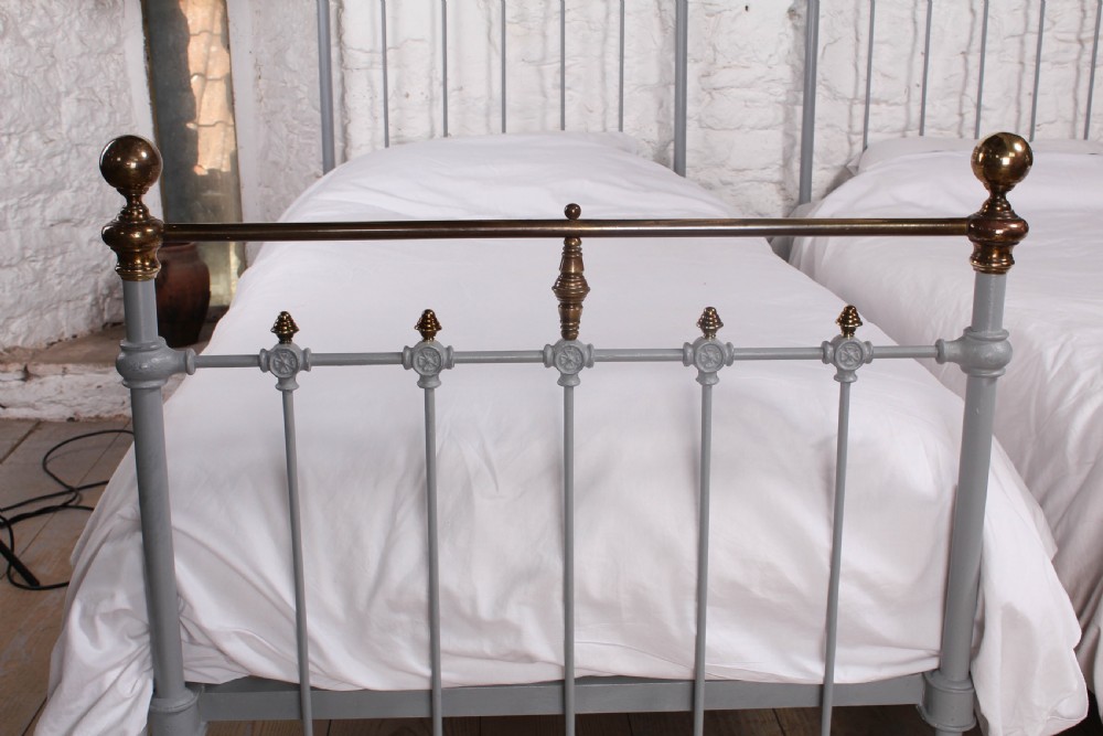 Gorgeous pair of French classic brass and iron singles View V