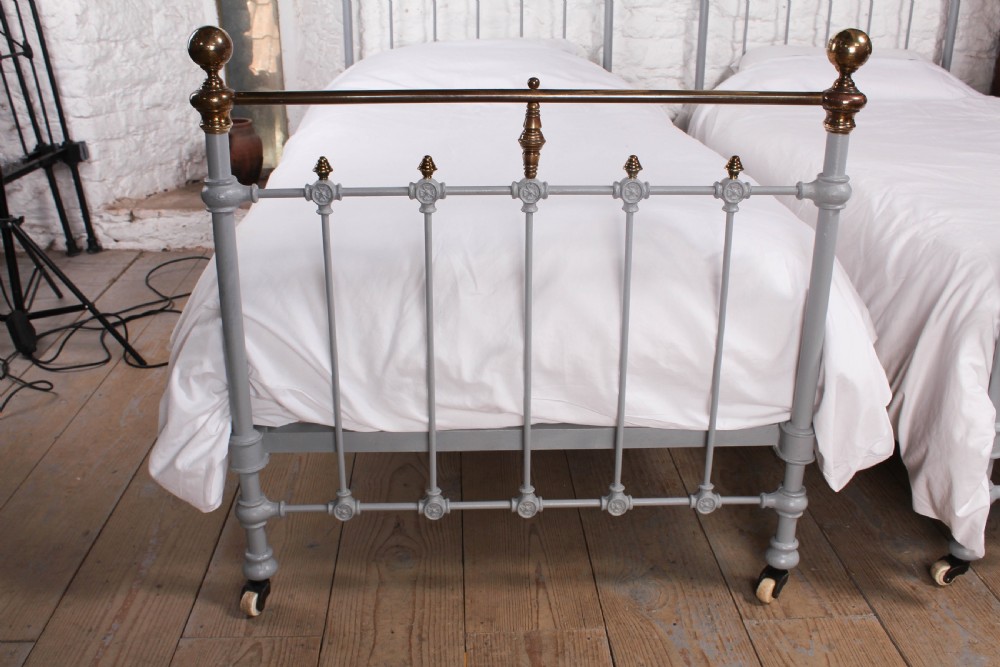 Gorgeous pair of French classic brass and iron singles View VI