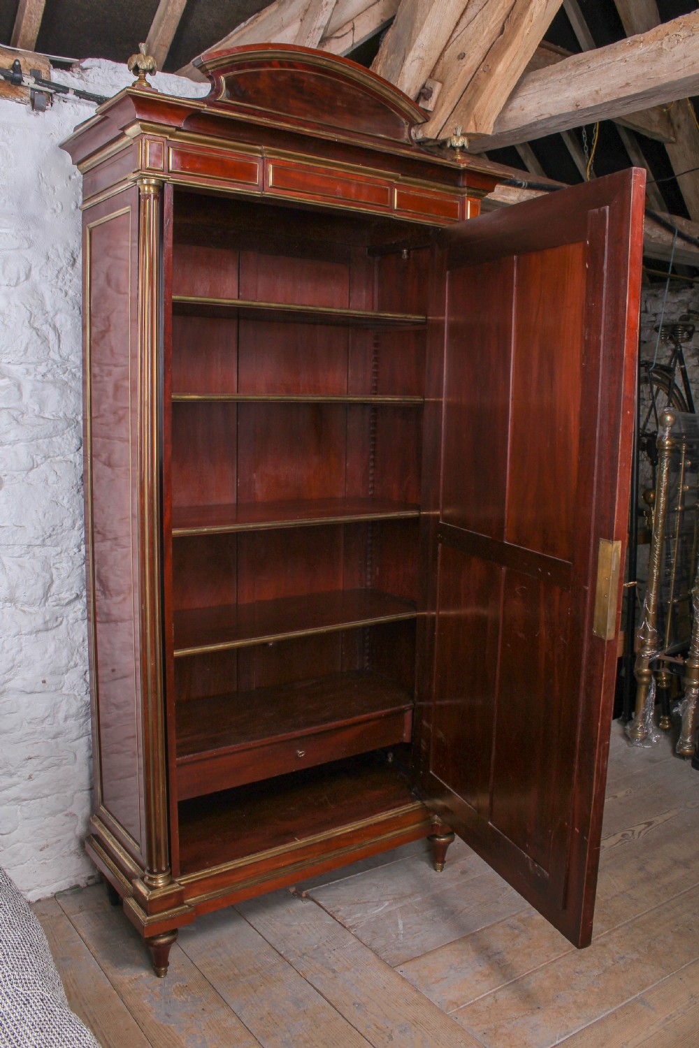 Lovely single door mahogany armoire with brass inlay View V