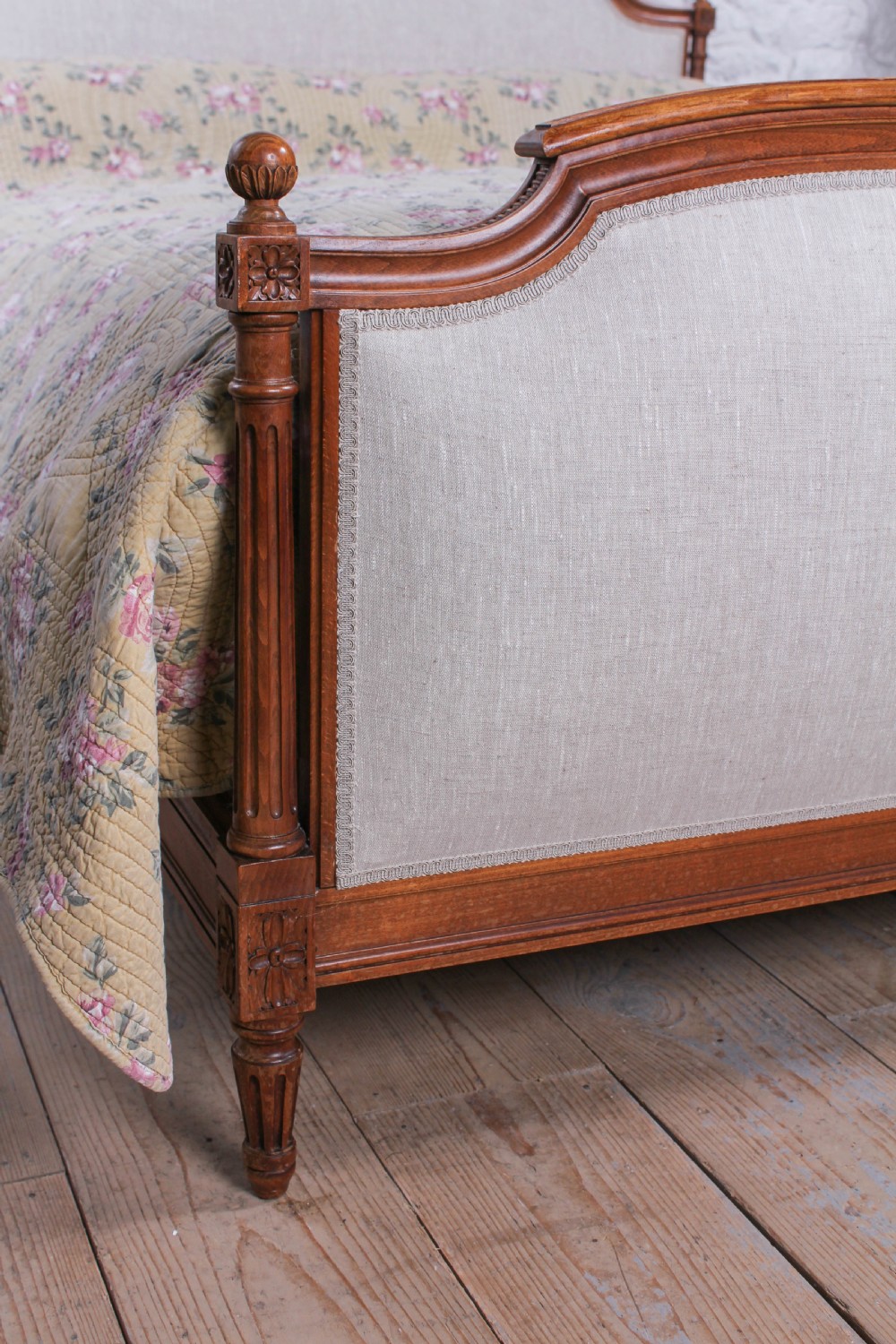 Newly upholstered walnut French Empire style king size bed View II