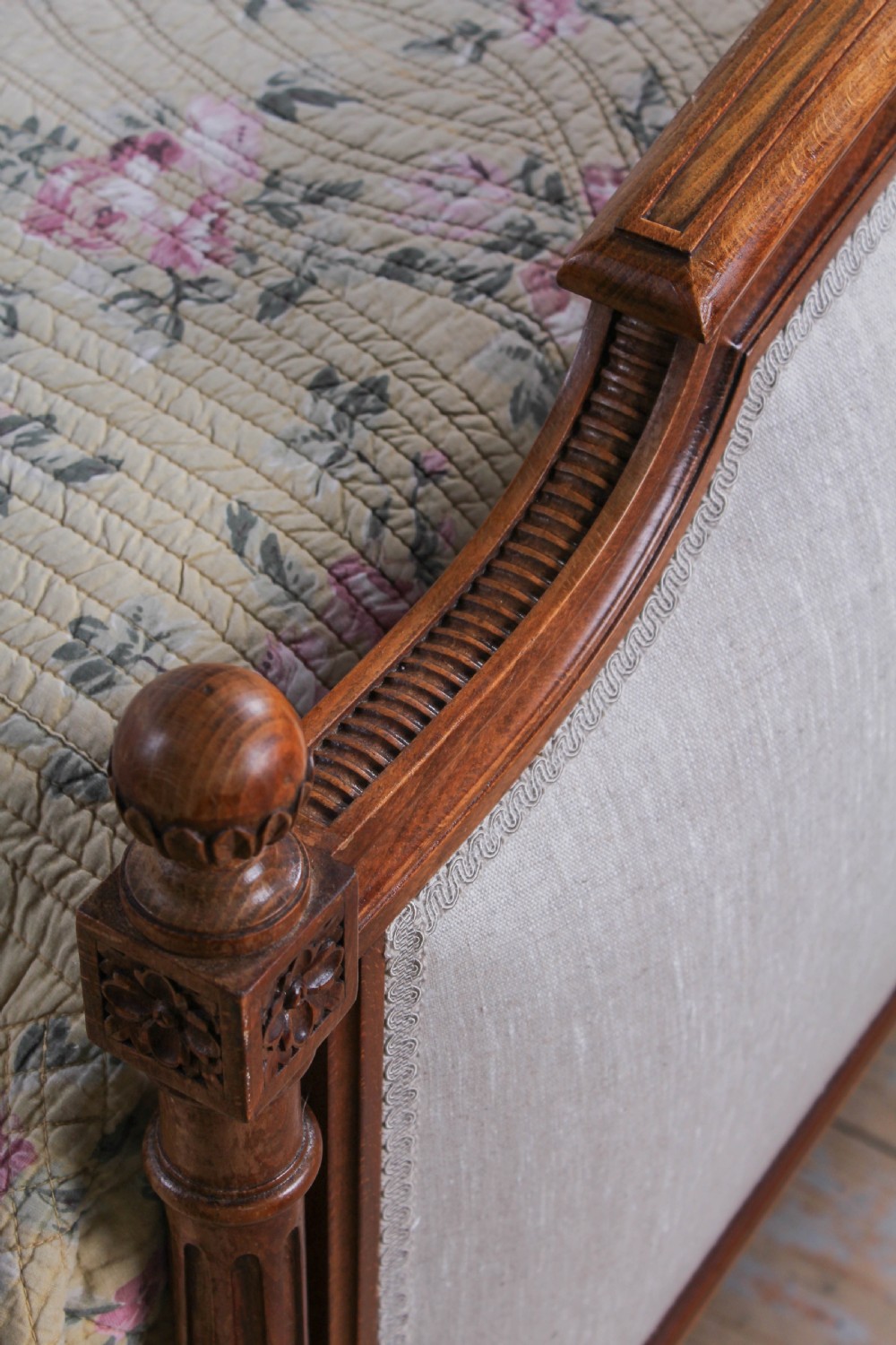 Newly upholstered walnut French Empire style king size bed View V
