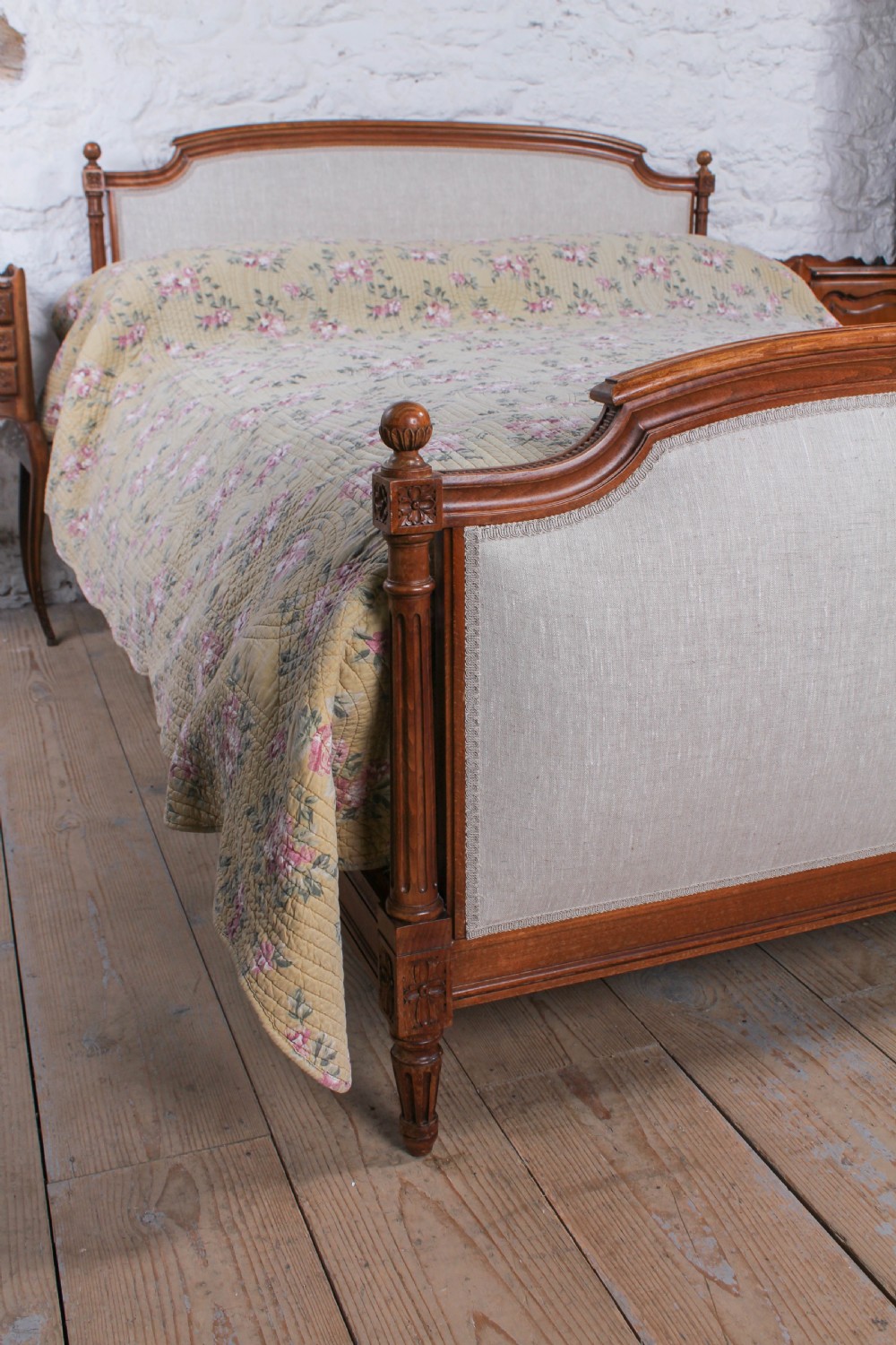 Newly upholstered walnut French Empire style king size bed View IX