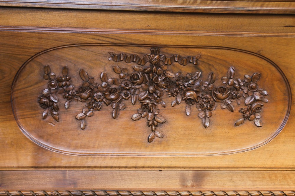 Impressive and beautiful large king size carved walnut bed and matching bedsides. View III