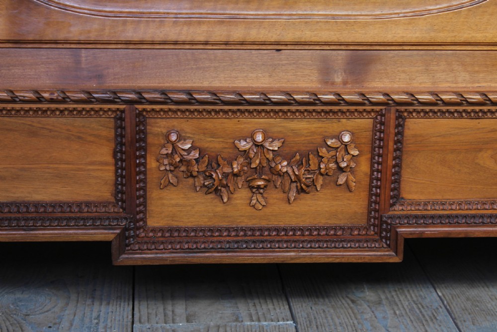 Impressive and beautiful large king size carved walnut bed and matching bedsides. View IV