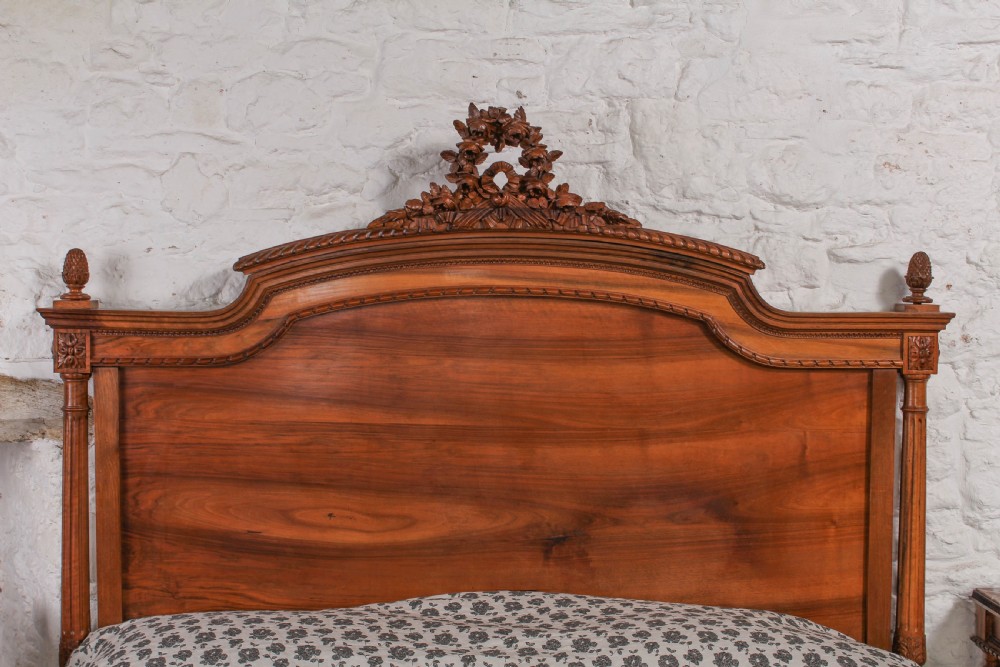 Impressive and beautiful large king size carved walnut bed and matching bedsides. View X