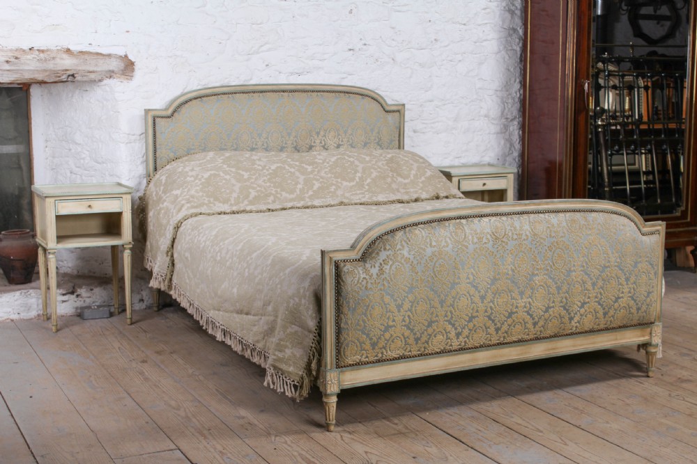 Original French Empire style upholstered king sized bed and matching bedsides