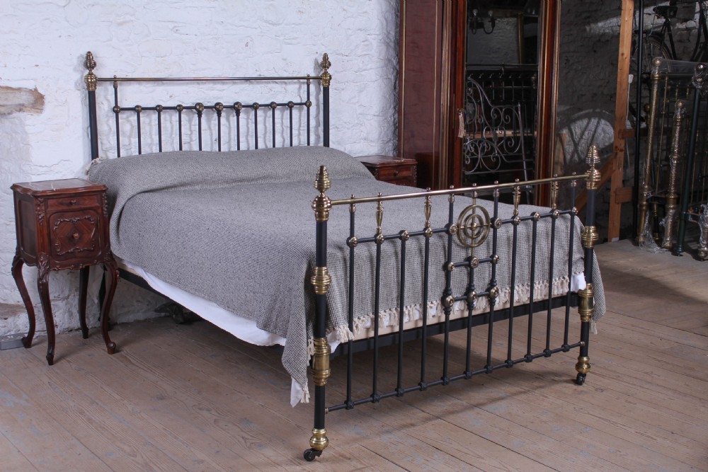 Magnificent king size Victorian black and brass bed