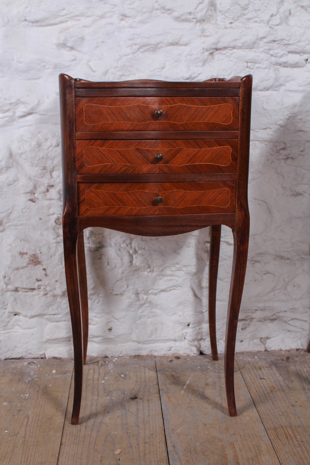 Pretty pair of three drawer French fruitwood bedsides View V