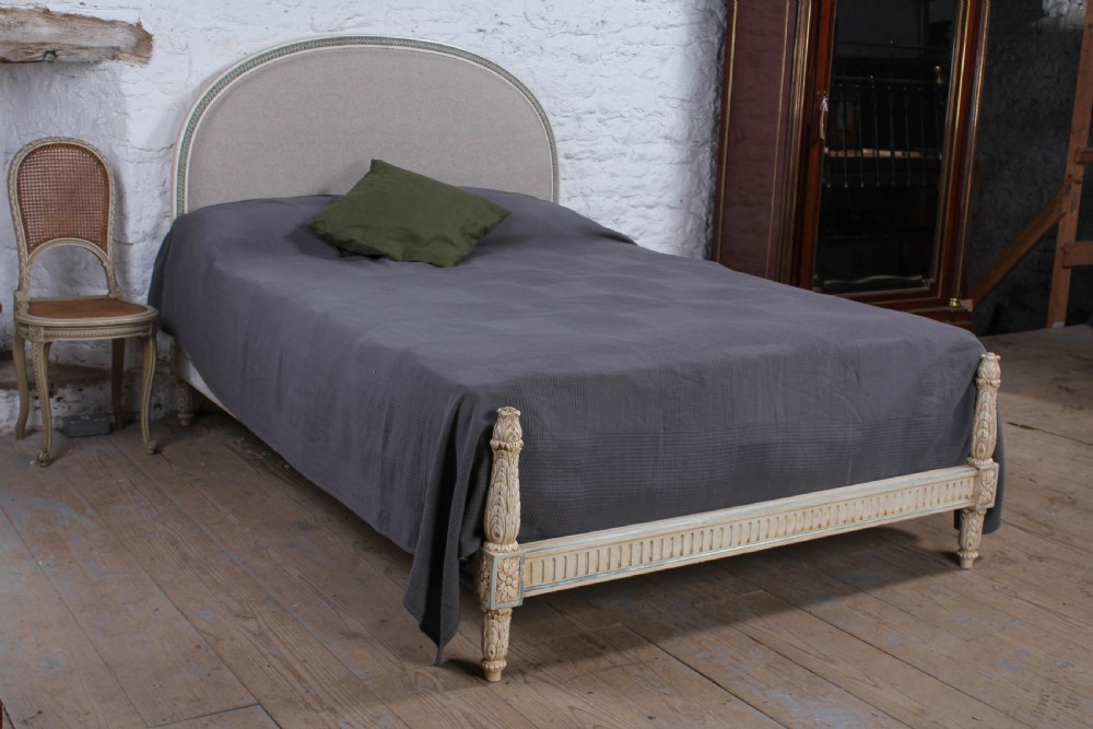Newly upholstered French low end king size bed