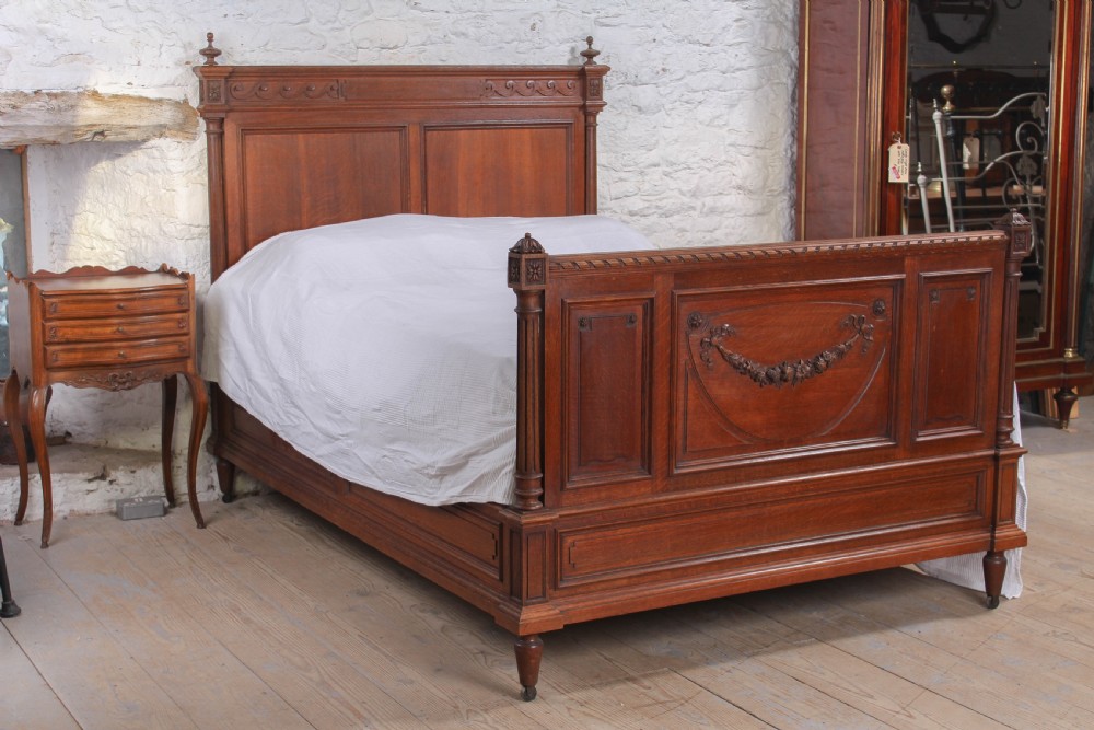 Carved oak French gentlemans double bed 