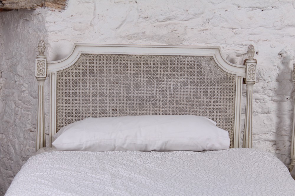 Pair of painted single caned low end bed View V