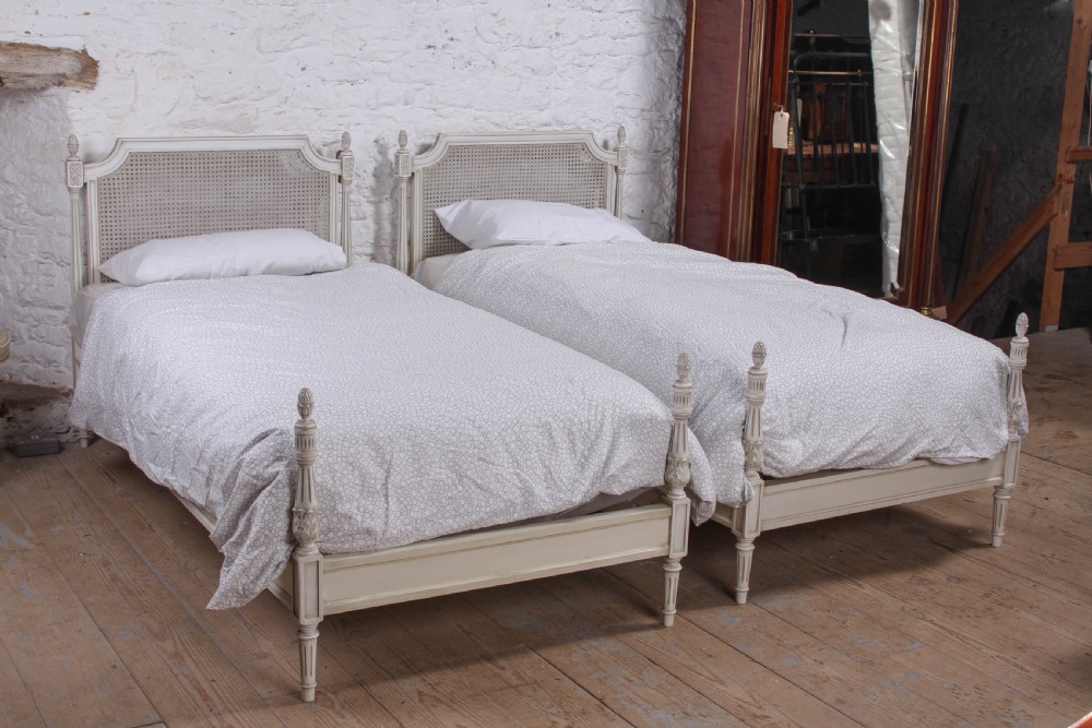 Pair of painted single caned low end bed View VIII