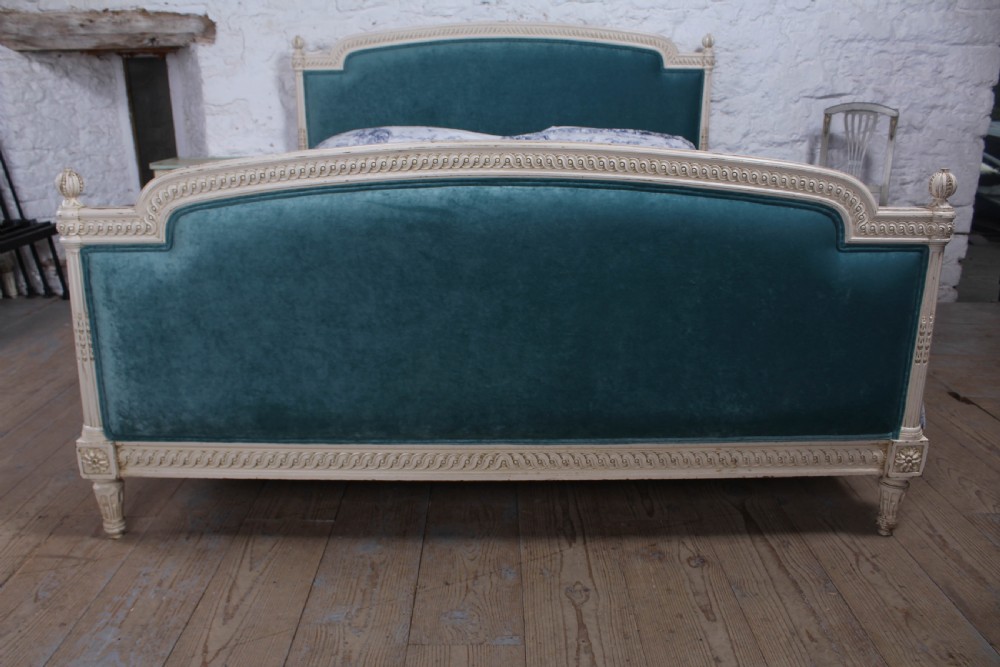 Handsome carved French super king size upholstered bed View II
