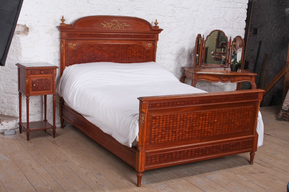 Very attractive parquetry and ormalu double bed and matching bedside