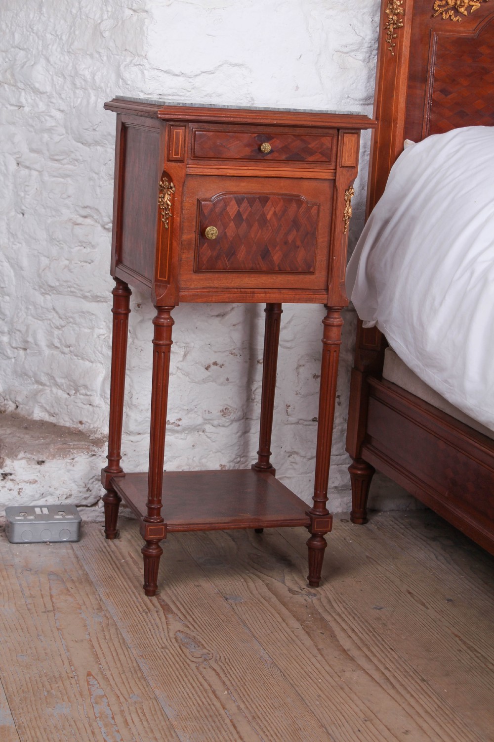 Very attractive parquetry and ormalu double bed and matching bedside View VII