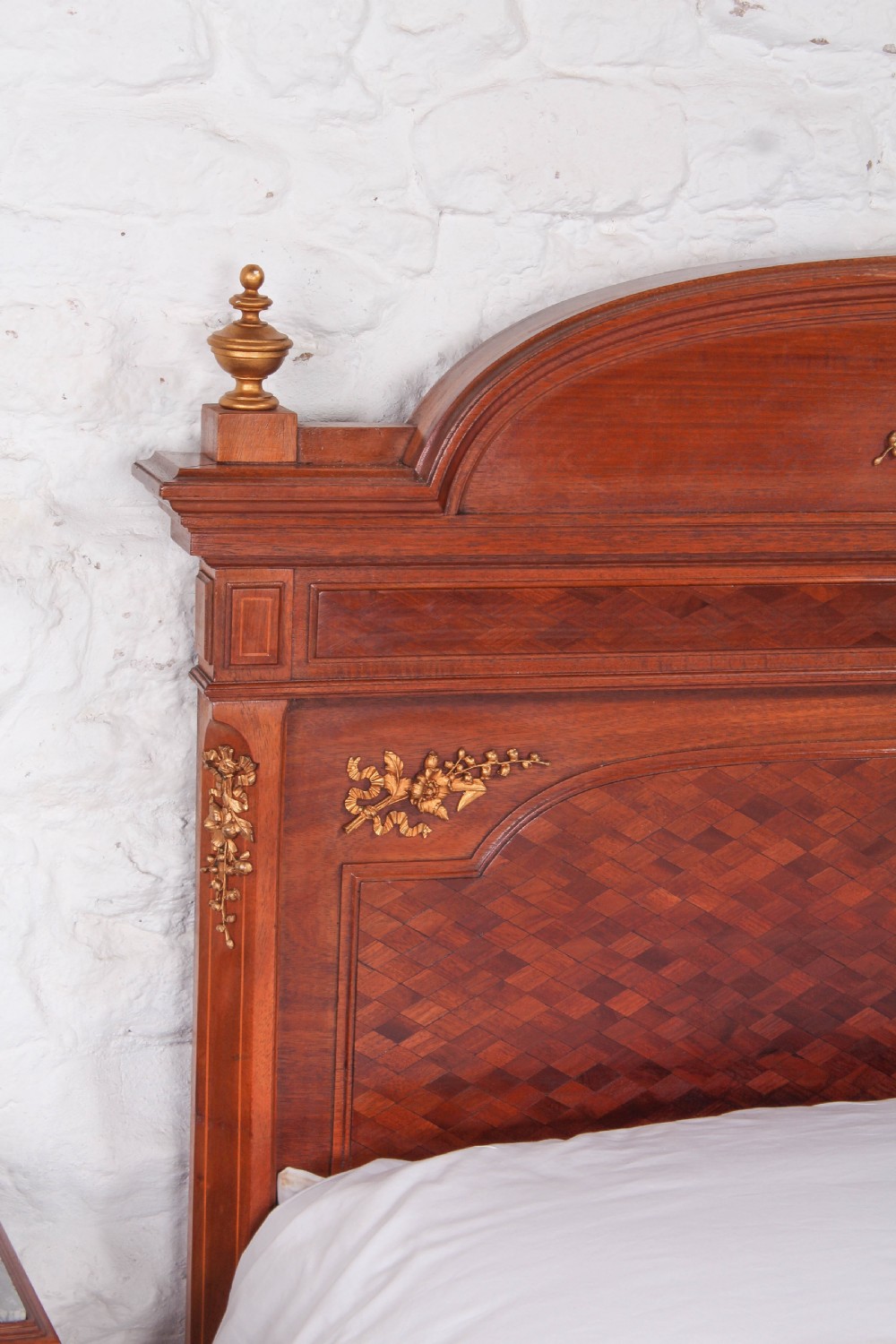 Very attractive parquetry and ormalu double bed and matching bedside View IX