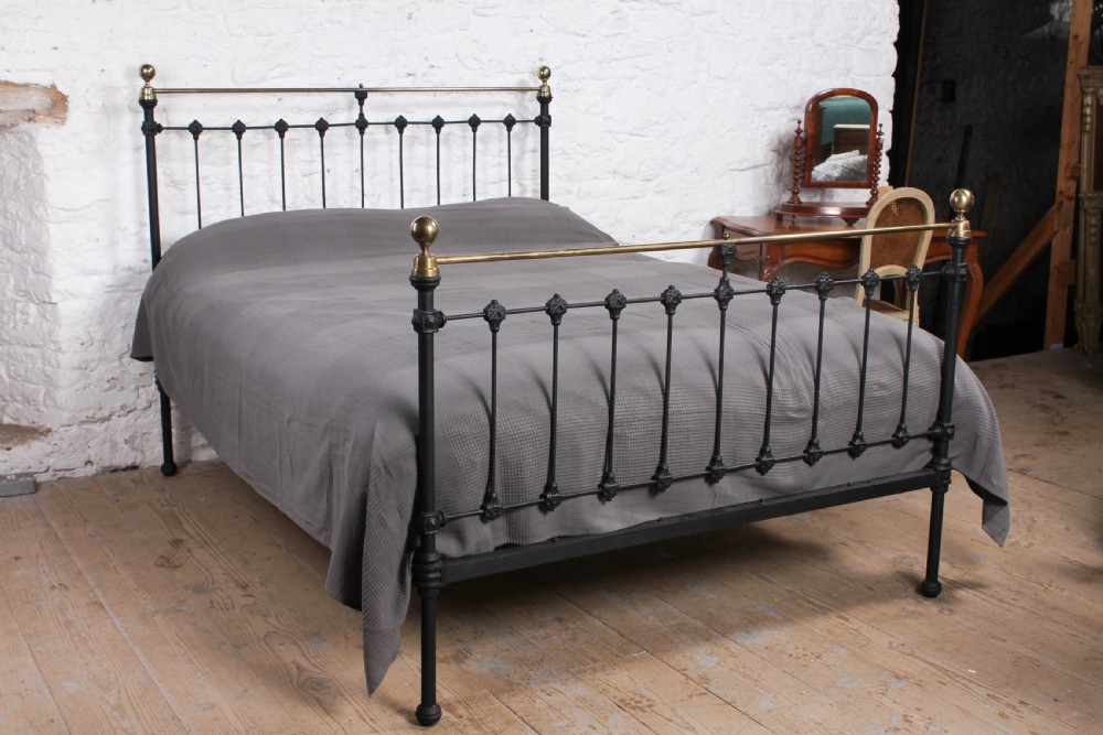 Classic Victorian king size brass and iron bed