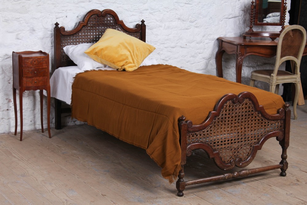 Single caned oak bed