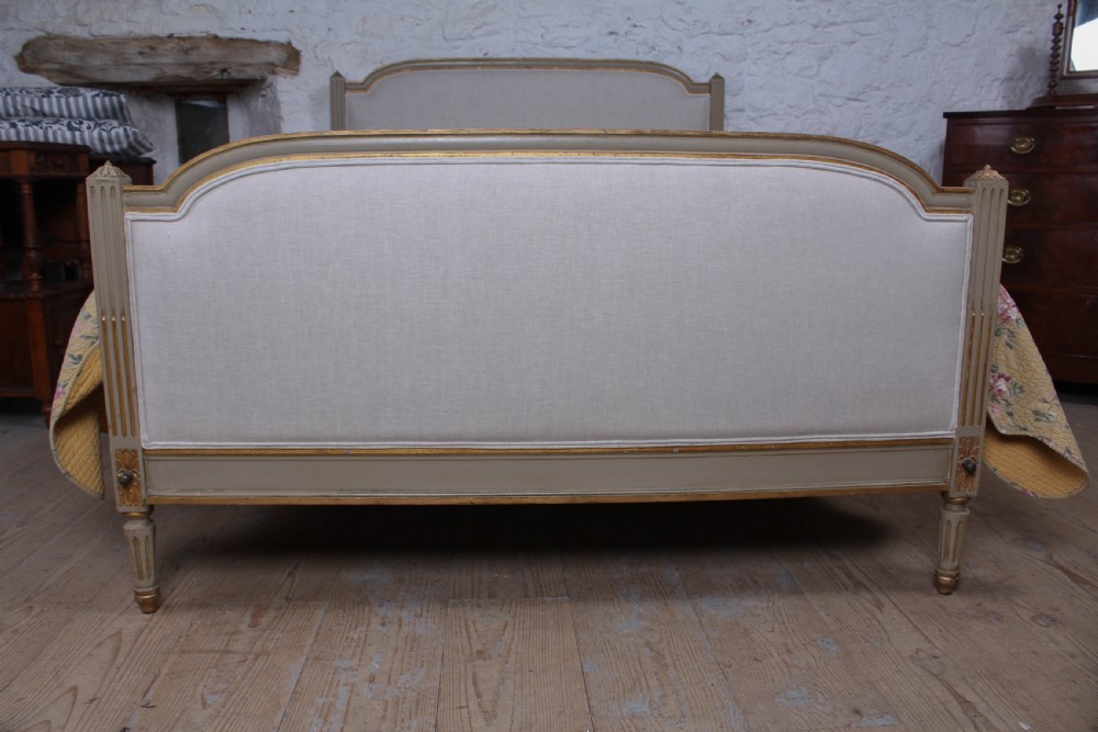 Lovely newly upholstered gilded Louis XVI style king size bed. View II