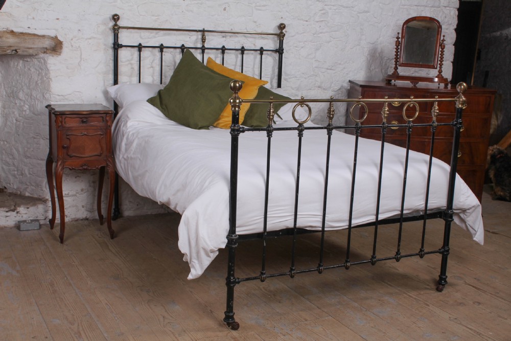 Lovely good original Victorian black and brass double bed
