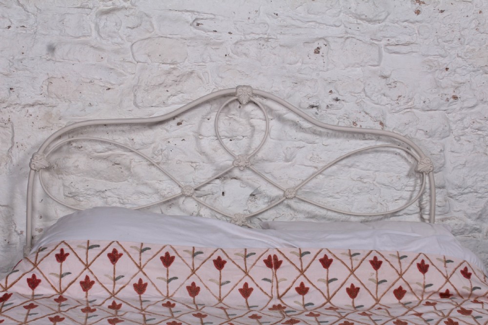 Pleasingly shaped all iron Irish king size no end bed View II