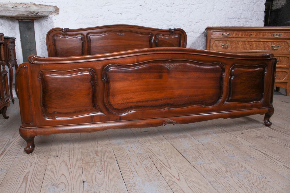 2 meter wide super king size solid walnut bed with matching bedsides View V