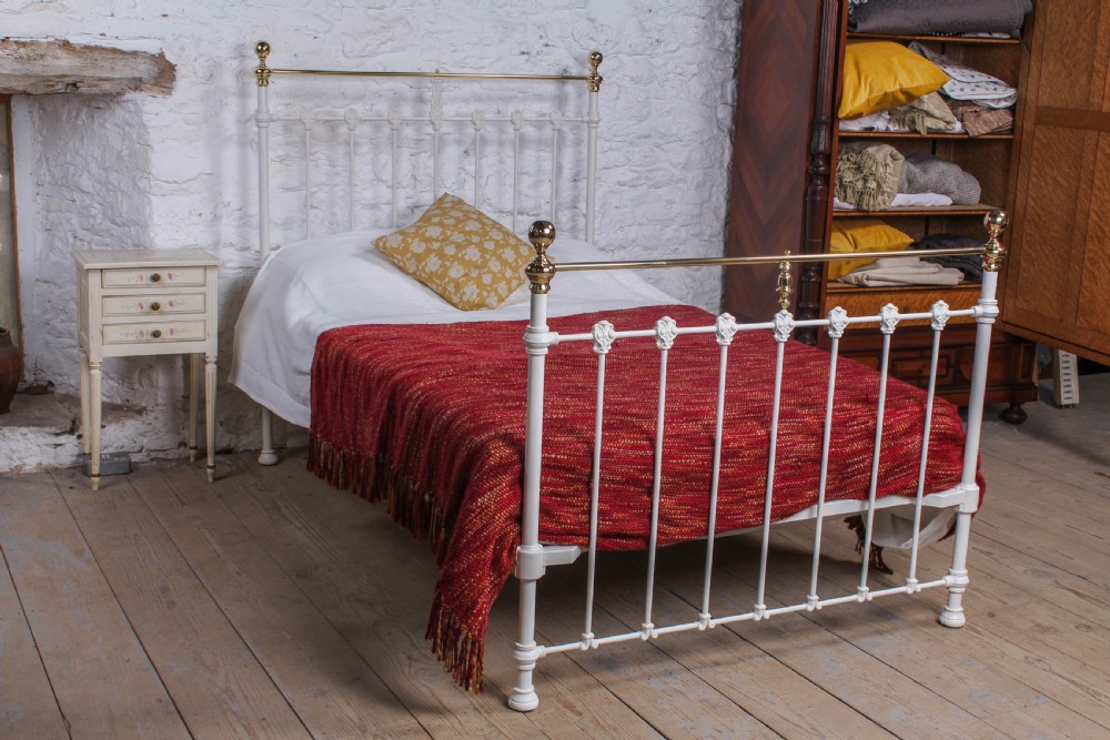 Classic Victorian queen size brass and iron bed