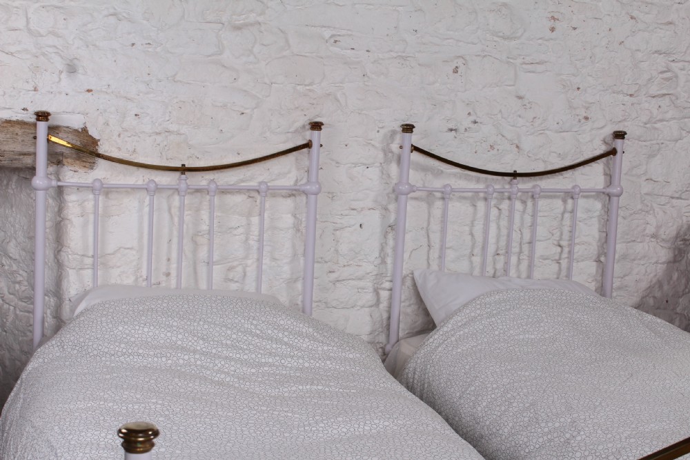 Very nice pair of Edwardian dip rail single beds View V