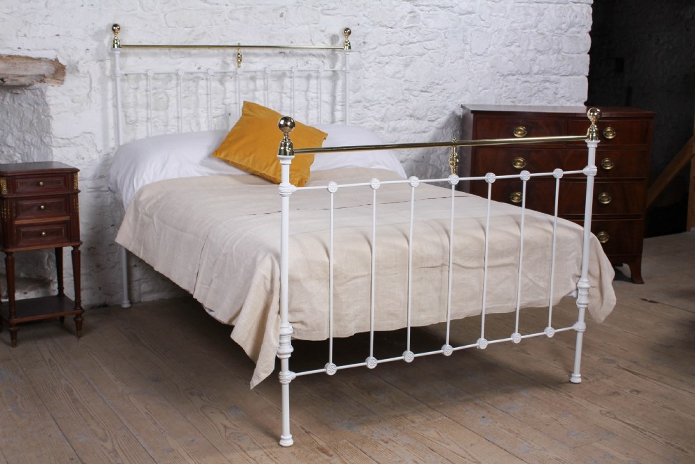 Classic Victorian white and brass double bed