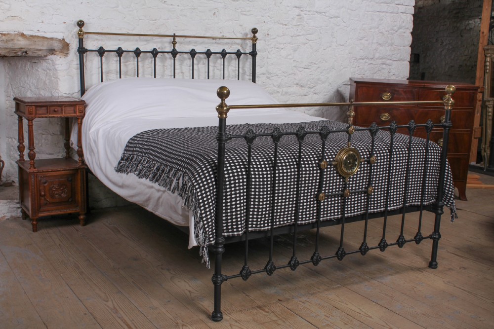 King size Victorian brass and iron bed with mirror motif