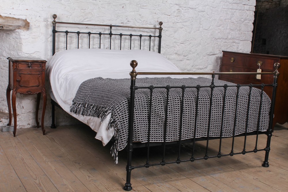 Classic Victorian antiqued brass and iron king size bed