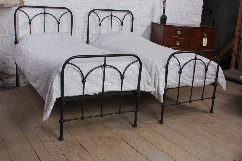Lovely simple pair of all iron single beds