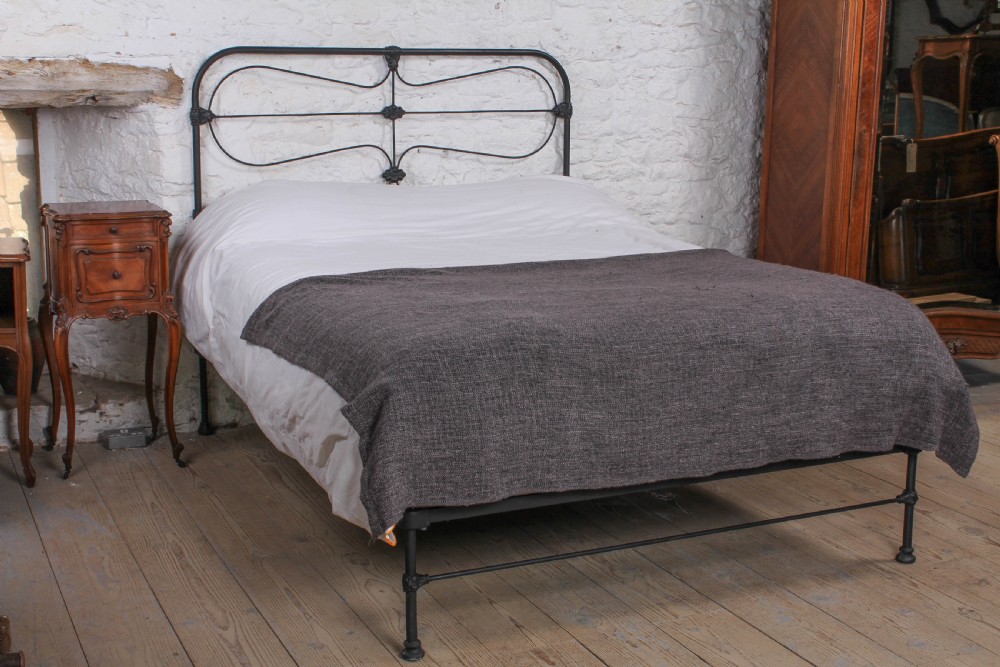 Pleasingly simple all iron king size nioend bed View II