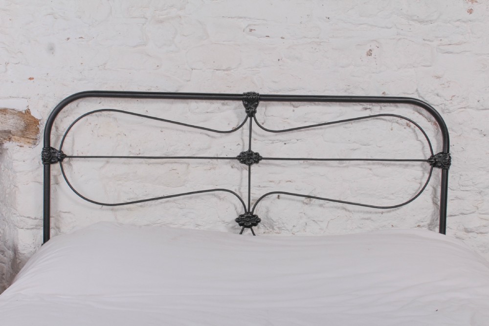 Pleasingly simple all iron king size nioend bed View IV