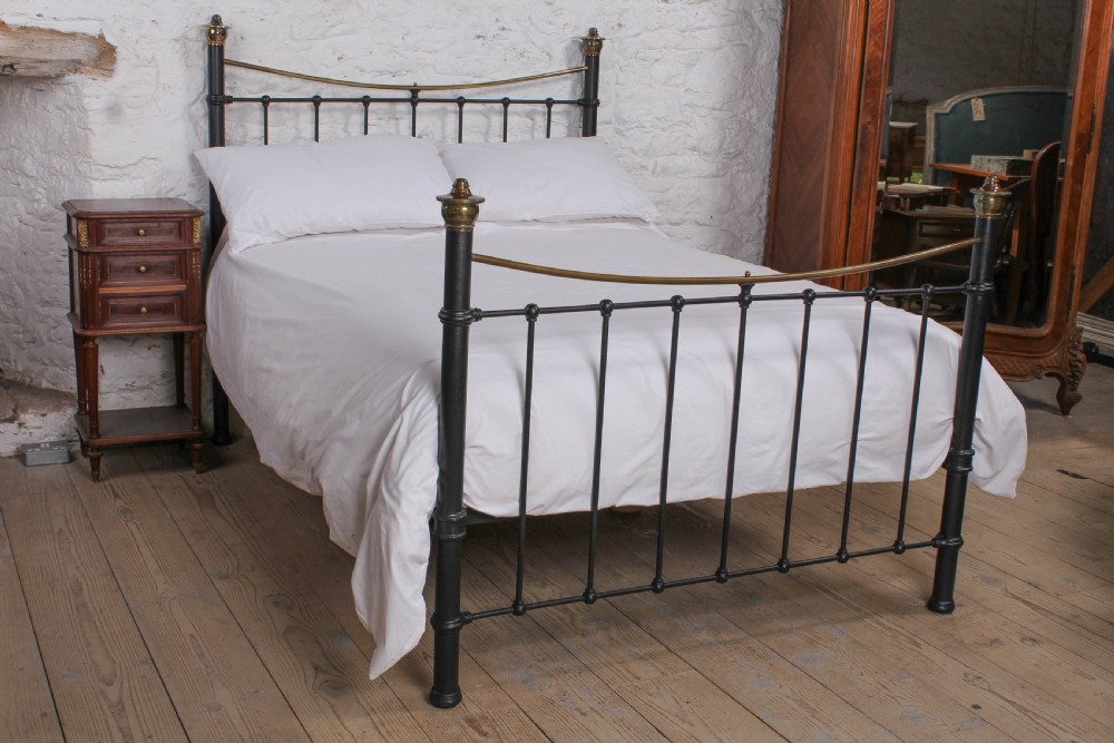 Classic Edwardian dip rail brass and black double bed