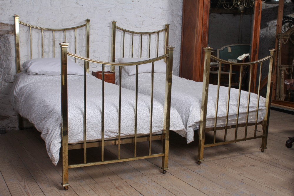 Pair of Maple and co elegant Edwardian single beds 