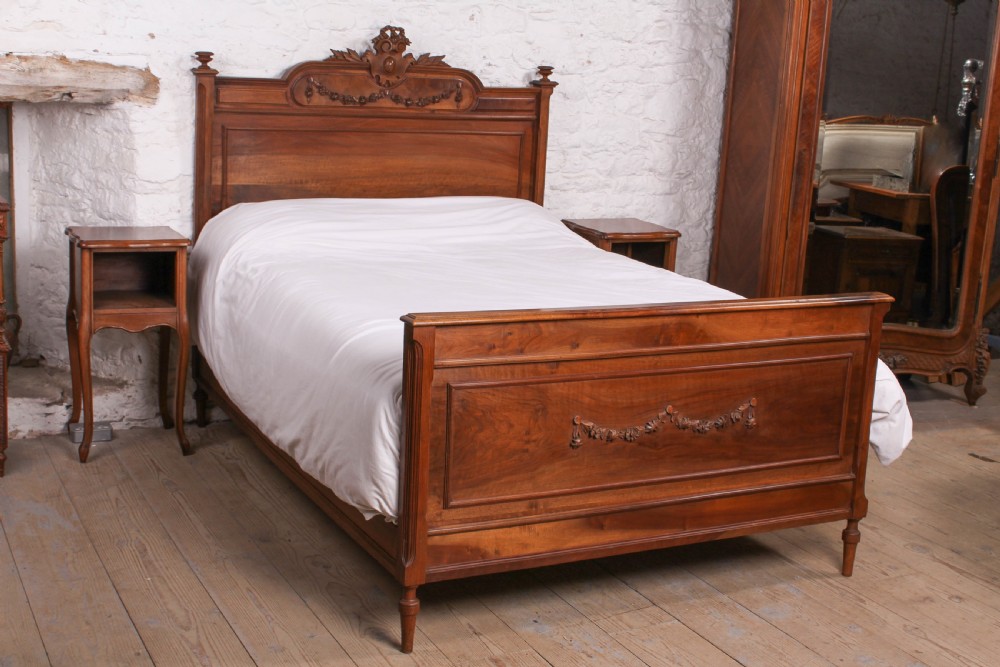 Attractive French walnut double bed