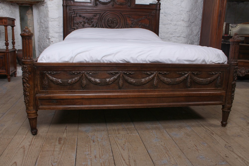 Fabulous Renaissance style carved oak double bed with low foot board View II