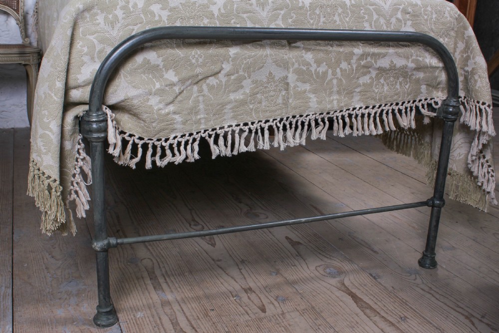 Lovely simple pair of utilitarian single iron beds View IV