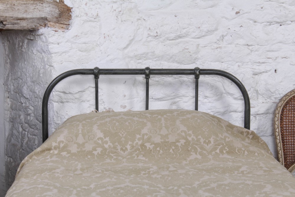 Lovely simple pair of utilitarian single iron beds View VII