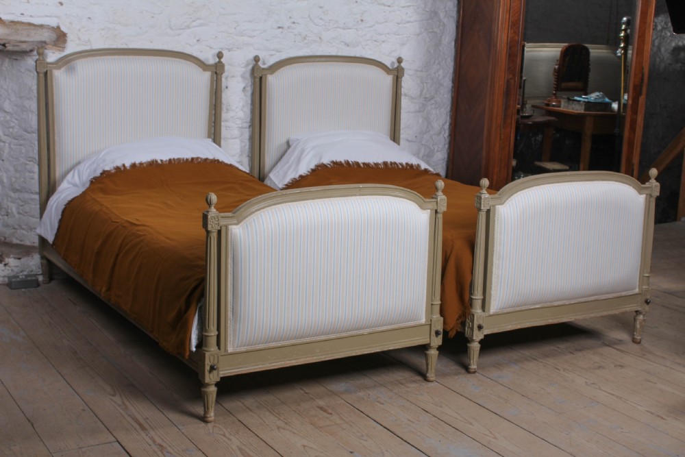 Pretty pair of matching French newly upholstered single beds