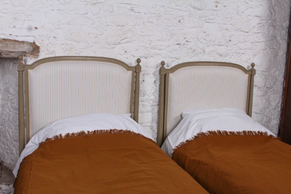 Pretty pair of matching French newly upholstered single beds View VII