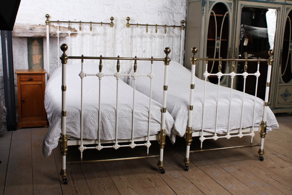 Very special pair of single brass and iron beds by Maple and Co (can be joined) 