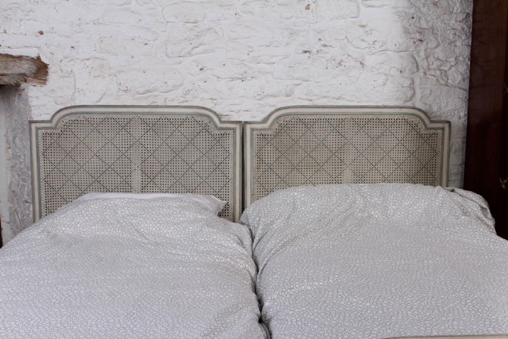 Pretty matching pair of French caned single  beds View III