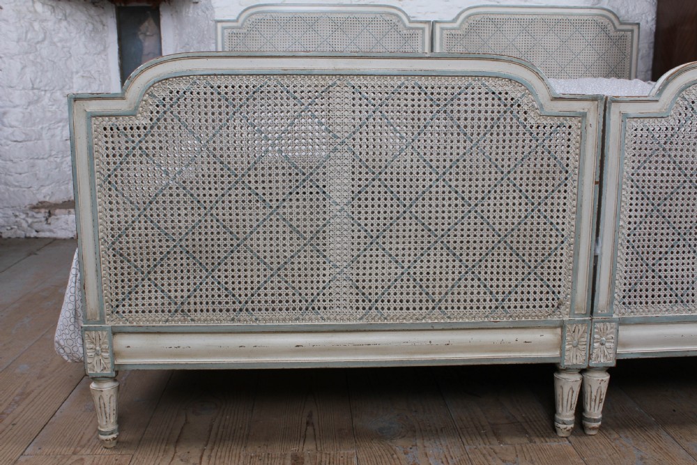 Pretty matching pair of French caned single  beds View IX