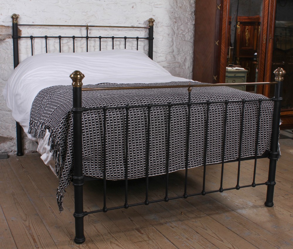 Sturdy classic Edwardian brass and black king size bed