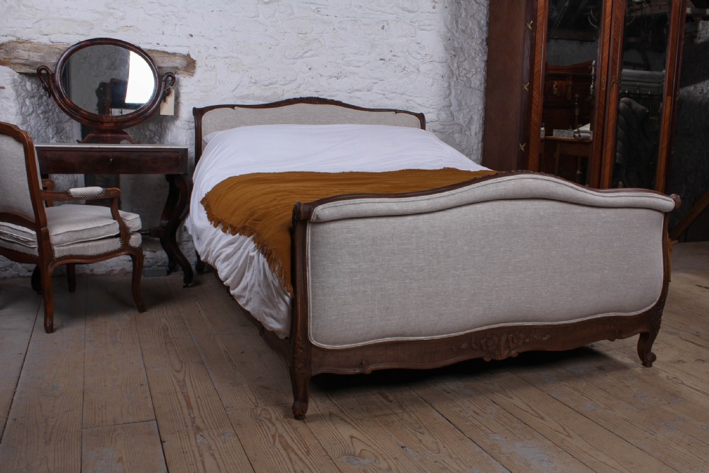 Newly upholstered French sleigh style king size bed