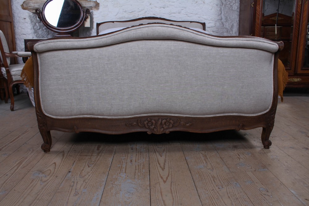Newly upholstered French sleigh style king size bed View II