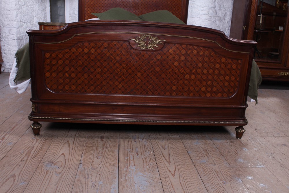 Handsome king size mahogany and fruitwood decorative bed View II